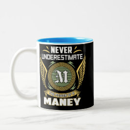 Unterschätze niemals die Macht eines Maney Zweifarbige Tasse