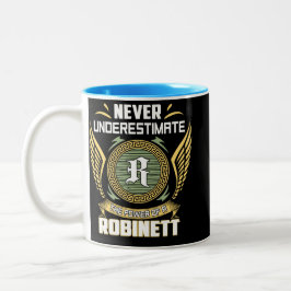 Unterschätze niemals die Macht eines Robinett Zweifarbige Tasse