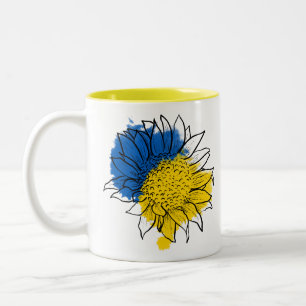Unterstützung für Blaue und Gelbe Sonnenblumen in Zweifarbige Tasse