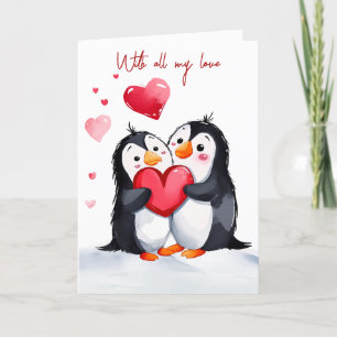 Valentinpinguine mit rotem Herzen Feiertagskarte