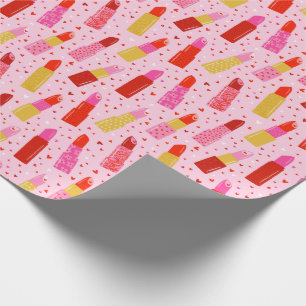 Valentinstag Lipsticks auf hellrosa Geschenkpapier