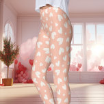 Valentinstag Pfirsich und Weißherz Muster Leggings<br><div class="desc">Feiern Sie Liebe in Komfort und Stil mit den Leggings des Valentinstag in Peach und White Heart Pattern. Diese Leggings mit weichen Pfirsichtönen und weißen Herzdrucken sind eine niedliche und subtile Art, Ihre Romantik auszudrücken. Diese Leggings sind perfekt für Valentinstag-Events geeignet oder fügen Ihren lässigen Outfits eine hübsche Touch hinzu....</div>