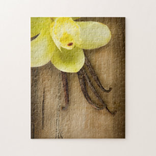 Vanilleschoten und Blüte auf Holzuntergrund Puzzle