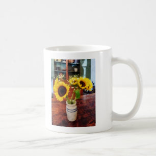 Vasenvase mit Sonnenblumen Tasse