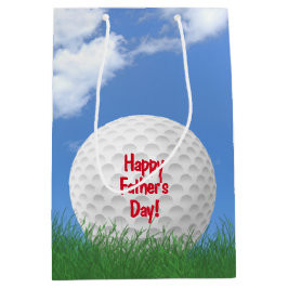 Vatertag-Golfball im Gras Mittlere Geschenktüte