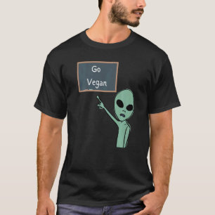 Vegane Alien, die auf die Tafel zeigt, isst kein F T-Shirt