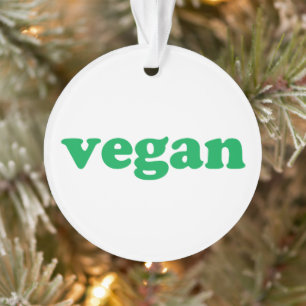 "vegane" grüne Buchstaben, weißer Hintergrund Ornament