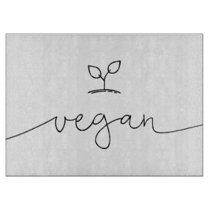 Vegane minimalistische Hintergrundfarbe Schneidebrett