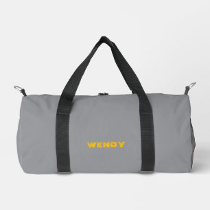 Verblasster gelber benutzerdefinierter Text auf Gr Duffle Bag