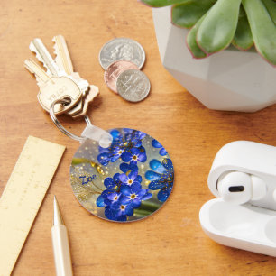 Vergessen Sie nicht die Blume mit Goldakzenten Schlüsselanhänger