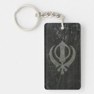 Verkratztes und getragenes graues SikhKhanda Schlüsselanhänger