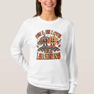 Verliebe dich in das Lernen Retro-Lehrer-Kürbis T-Shirt