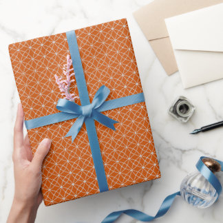Verriegelte Kurven auf dunklem Orange Geschenkpapier