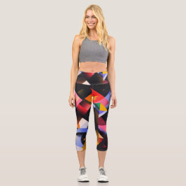 Verschiedene bunte Formen auf dunklem Hintergrund Capri Leggings