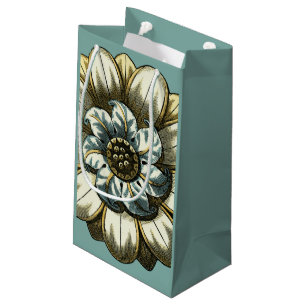 Verziertes Blumenmedaillon auf hellblauem Kleine Geschenktüte