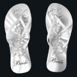 Verziertes Design mit weißem Satin und Silber | Br Flip Flops<br><div class="desc">Brautparty Flop Shoes bereit für Sie zu personalisieren. Wenn nötig... Sie können mit dem Zazzle-Design-Tool-Bereich mit Ihren eigenen Texten, Textfarben und Schriftart neu starten. ✔ Hinweis: Nicht alle Vorlagenbereiche müssen geändert werden. 📌 Wenn Sie weitere Anpassungen benötigen, klicken Sie bitte auf den Button "Weitere Anpassungen vornehmen" oder "Design anpassen oder...</div>