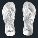 Verziertes Design mit weißem Satin und Silber | Br Flip Flops<br><div class="desc">Brautparty Flop Shoes bereit für Sie zu personalisieren. Wenn nötig... Sie können mit dem Zazzle-Design-Tool-Bereich mit Ihren eigenen Texten, Textfarben und Schriftart neu starten. ✔ Hinweis: Nicht alle Vorlagenbereiche müssen geändert werden. 📌 Wenn Sie weitere Anpassungen benötigen, klicken Sie bitte auf den Button "Weitere Anpassungen vornehmen" oder "Design anpassen oder...</div>
