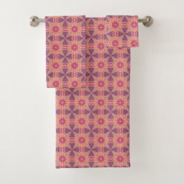 vibrant geometric pattern in pink, purple,  orange badhandtuch set