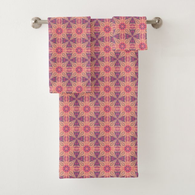 vibrant geometric pattern in pink, purple,  orange badhandtuch set (Insitu)