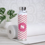 Vibrant Pink and Green Stripes Monogram Trinkflasche<br><div class="desc">This personalized insulated bottle features your monogrammed initial in white encircled by a vibrant pink background with a pink, green and white candy cane striped pattern. Great for keeping those summertime drinks cold or for adding warm feeling for your loved ones over the cold months! Makes a great bridal party...</div>