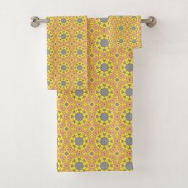 vibrant yellow geometric pattern with blue and red badhandtuch set