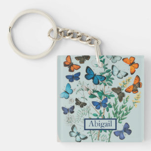 Viele blaue und orange Schmetterlinge Schlüsselanhänger