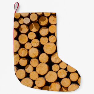 Viele Holzstämme runder Teakholz-Baumstämme Kleiner Weihnachtsstrumpf