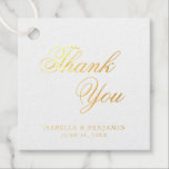 Vielen Dank für Ihre elegante Calligraphy Gold Foi Geschenkanhänger<br><div class="desc">Elegante typografische Gastgeschenk Hochzeit Tags mit einem einfachen Design mit der Meldung "Danke" in der Kalligraphie und Ihre Namen und Datum unten. Alle Designelemente sind in realer Goldfolie auf weißem Hintergrund. Diese extravaganten Tags sind ideal für eine feierliche Hochzeit und fügen eine klassische Touch zu Ihren Favoriten hinzu.</div>