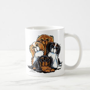 Vier Kavalier-König Charles Spaniels Tasse