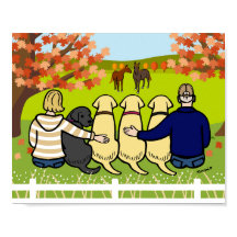 Vier Labradoren und Eltern im Herbst