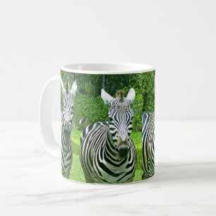 Vier Zebras im Wiesenlicht Tasse