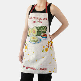 Vietnamesischer Familienkoch Banh Tet erblüht Kuns Schürze