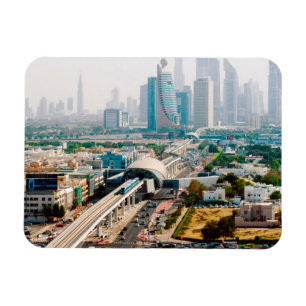 View of city metro line and skyscrapers magnet