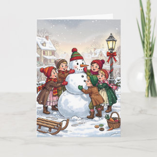 Viktorianische Kinder bauen einen Schneemann Karte