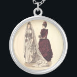 Viktorianisches Hochzeitskleid Versilberte Kette<br><div class="desc">Für jeden, der über eine Viktorianische Hochzeit nachdenkt, ist dies ein wunderschönes Bild aus einem Godey's Lady's Book aus dem Jahr 1886, in dem hochmoderne Illustrationen von Damenbekleidung gezeigt wurden. Dieses altmodische Bild zeigt das Hochzeitskleid und das Kleid der Brautjungfrau, das jeder Viktorianischen zu besitzen wollte. Ideal für anstehende alte...</div>