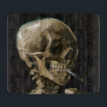 Vincent van Gogh Art Schneidebrett<br><div class="desc">Vincent van Gogh (Niederländisch, 1853 - 1890) Schädel eines Skeletts mit brennender Zigarette, 1885-86, Öl auf Leinwand Ungerahmt: 32 cm × 24, 5 cm (13 in × 9, 6 in) Früharbeit von Vincent van Gogh. Dieses kleine Gemälde ist Teil der ständigen Sammlung des Van Gogh Museums in Amsterdam. Es wurde...</div>