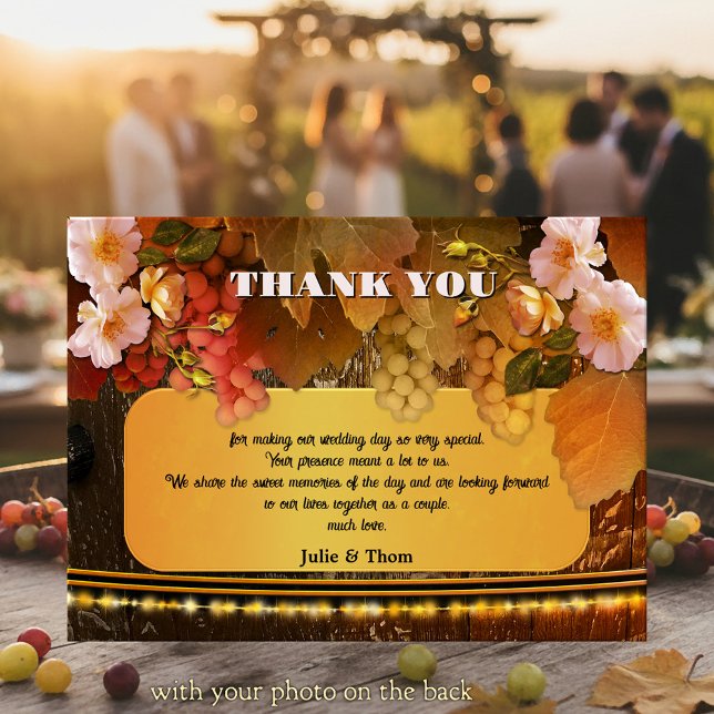 Vineyard or Winery Wedding Thank You Photo Card Einladung (Wedding Thank You card featuring grapes, peach colored roses and string lights on a wine barrel)