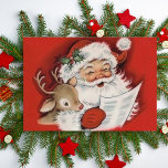 Vintag Jolly Santa mit Baby Rudolf Custom Feiertagskarte<br><div class="desc">Diese Weihnachtskarte zeigt eine Darstellung eines fröhlichen Weihnachtsmanns, der sich seine Liste anschaut, wie ein Baby Rudolf anschaut. Sentiment in der Karte lautet: "Möge Ihre Ferienzeit mit Liebe und Freude gefüllt werden. Frohe Weihnachten!" und kann nach Wunsch geändert oder bearbeitet werden. Fügen Sie Ihren Namen hinzu oder verließ Sie diesen...</div>