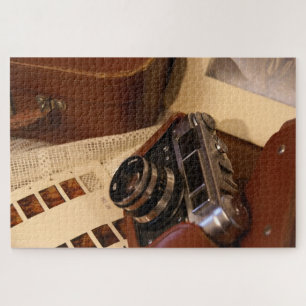 Vintage-Analogkamera im braunen Lederetui Puzzle