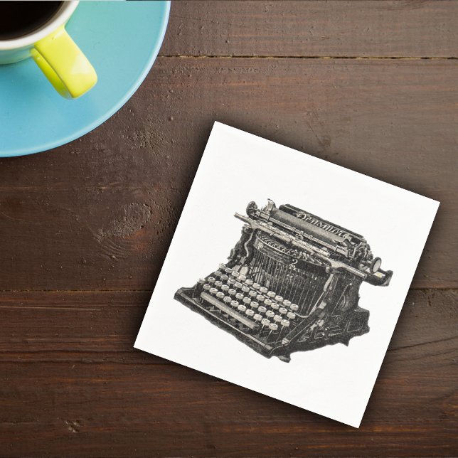 Vintage antike schwarze altmodische Schreibmaschin Serviette (Old vintage manual black tyepwriter from turn of century on white napkins.)