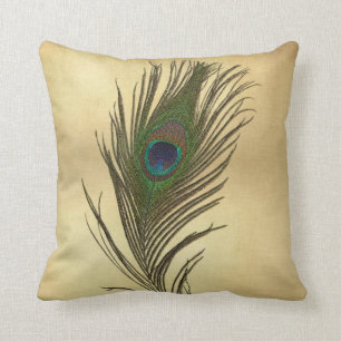 Vintage Blick-Pfau-Feder auf Gold Kissen
