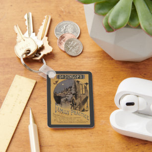 Vintage Buchbegleitungspraxis von Doktor Dunlop Schlüsselanhänger