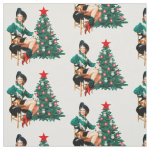 Vintage-Cowgirl auf Stuhl mit Weihnachtsbaum-Stoff Stoff