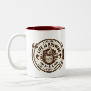 Vintage "Das Leben brodelt" Zweifarbige Tasse