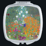 Vintage farbenfrohe Blume im Garten | Gustav Klimt Taschenspiegel<br><div class="desc">Ideal für Vintage Liebhaber, Kunstliebhaber und diejenigen, die einzigartige und künstlerische Accessoires schätzen, ist diese Vintage Blume im gärtnerisch inspiriert Kompaktspiegel ein Hot Item, das Retro-Ästhetik mühelos mit zeitgenössischer Mode kombiniert. Mit diesem Meisterwerk von Gustav Klimt steigern Sie Ihren Stil und tragen Sie ein Kunstwerk mit sich. Verwenden Sie die...</div>