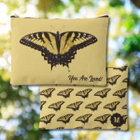 Vintage-gelber Schmetterling und Accessoire-Tasche
