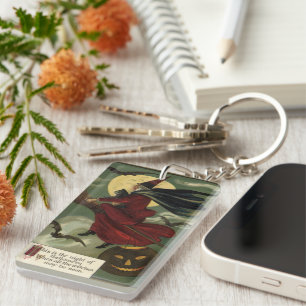 Vintage-Halloween-Hexe auf einem Besenstiel mit Ka Schlüsselanhänger