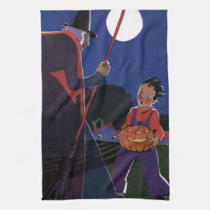 Vintage-Halloween, unheimliche Hexe mit Jungen Küchentuch
