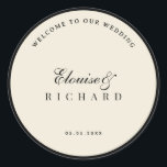 Vintage Ivory and Black Old Money Wedding Welcome Runder Aufkleber<br><div class="desc">Create a refined first impression with this ivory and black old money wedding welcome sticker, inspired by timeless vintage elegance and classic monochrome styling. The sophisticated ivory and black palette makes it perfect for luxury weddings, rehearsal dinners, engagement celebrations, welcome gift bags, and elegant wedding receptions. Ideal for sealing welcome...</div>