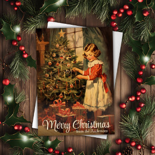 Vintage-Mädchen schmückt Weihnachtsbaum – individu Feiertagskarte
